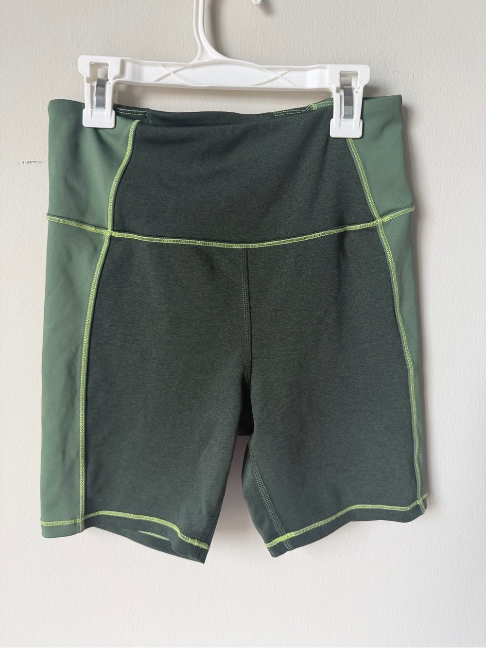 Good American Dark Green High-Rise Bike Shorts with Lime Stitching